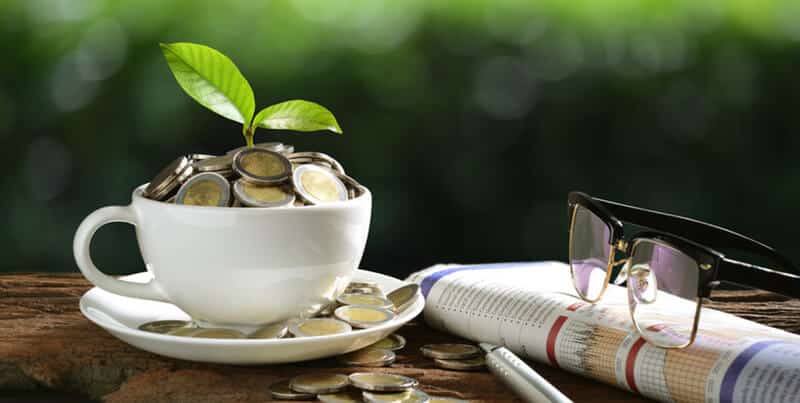 Coffee mug full of toonies | Why Some Investors Prefer Currency-hedged ETFs?